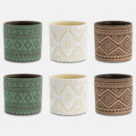 Six Κασπώ Luvio Πράσινο cylindrical ceramic planters in green, white, and brown with unique geometric tribal patterns, displayed in two rows of three on a white background.
